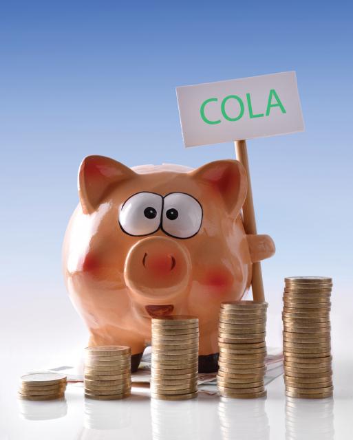 Piggy Bank holding COLA sign